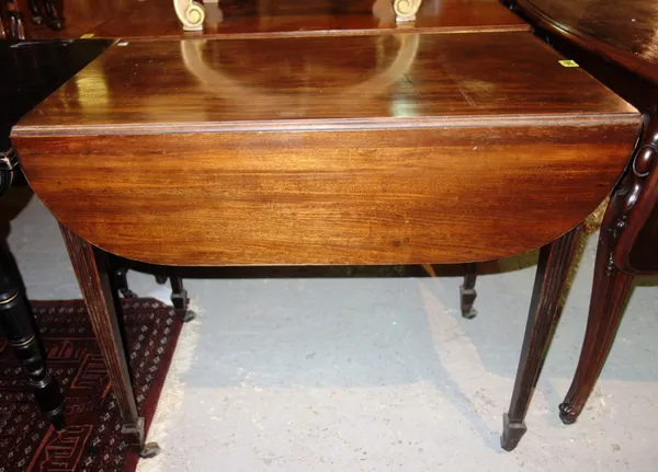 A George III mahogany drop flap table, on square tapering supports, 81cm wide x 72cm high.   K10
