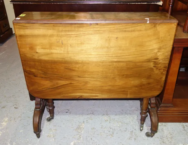 A late Victorian walnut Sutherland table, 76cm wide x 74cm high.   J6