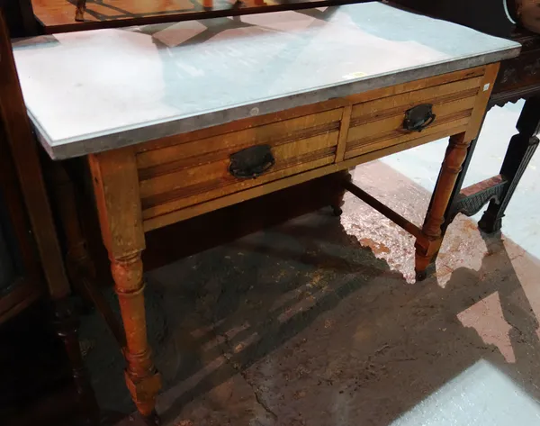 An Edwardian walnut two drawer washstand, with rectangular marble top, 112cm wide.    G9