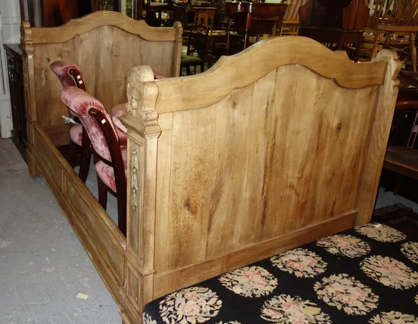 A 20th century pine single sleigh bed.  L8