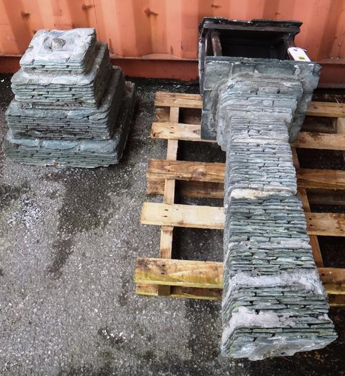 A 20th century bird table formed from slate tiles.   OUT