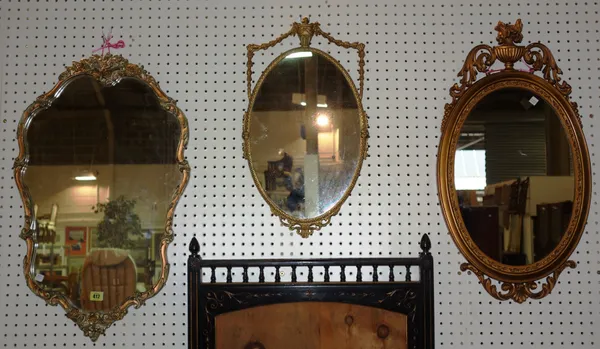 A group of three 20th century gilt framed wall mirrors, (3).  J11