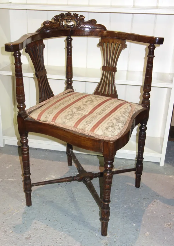 A pair of Edwardian mahogany corner chairs, together with an Edwardian child's folding chair, with cane seat/back, (3).   I4