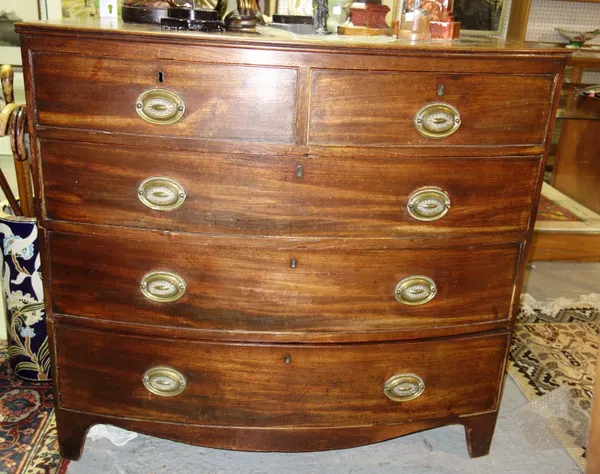 A Regency mahogany bowfront chest of two short and three long graduated drawers, on bracket feet, 106cm wide.C3
