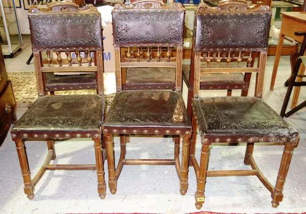 A set of six 19th century French walnut framed dining chairs, with brass studded leather upholstery, (6).  D2