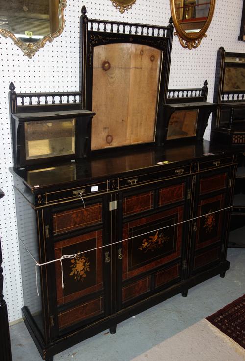 A 19th century Aesthetic movement mirrored back cabinet with burr walnut panels and marquetry inlaid decoration, 140cm wide.   J11