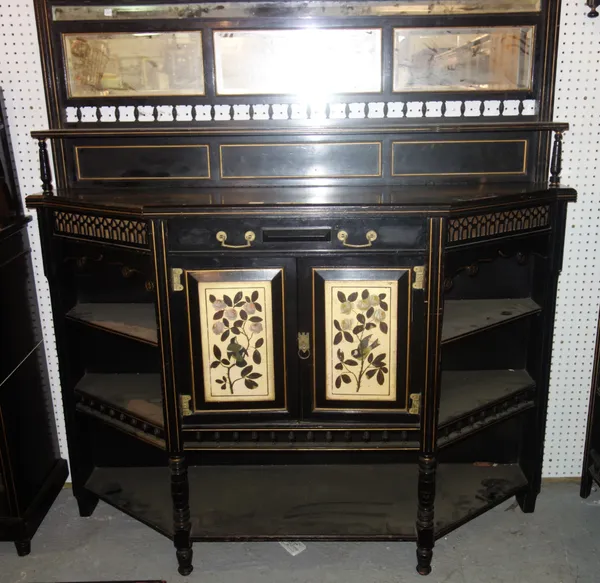 A 19th century Aesthetic movement, ebonised side cabinet with floral painted doors, 154cm wide.   L11