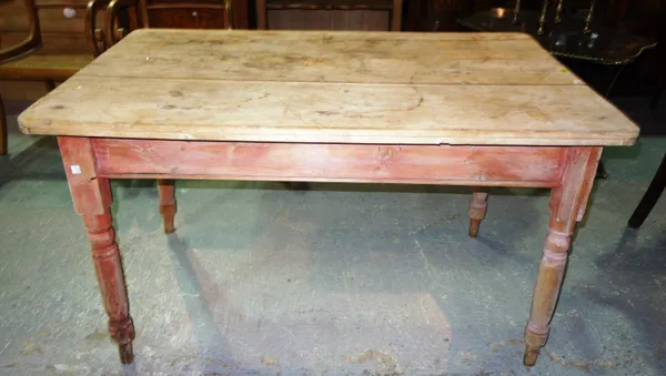 A small Victorian stripped pine kitchen table, 122cm wide x 72cm high.   F8