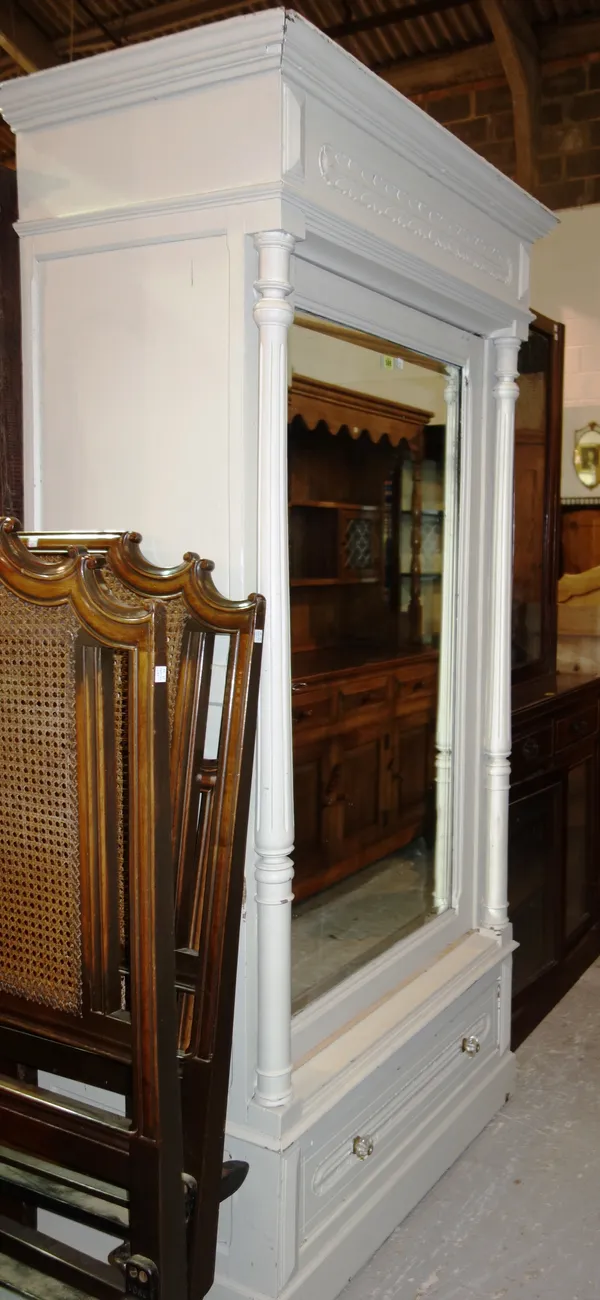 An 18th century style French white painted wardrobe with single mirror door and drawer base, 100cm wide x 200cm high.   L7