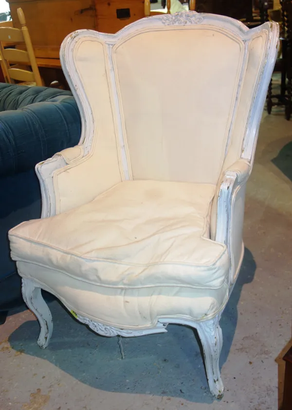 A Louis XV style grey painted wing back armchair on cabriole supports, (a.f.), 67cm wide.   G5