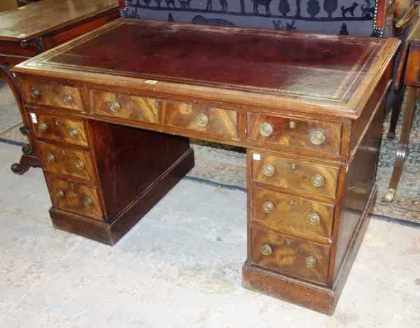 A 19th century mahogany pedestal desk with nine drawers about the knee, 118cm wide.    G5