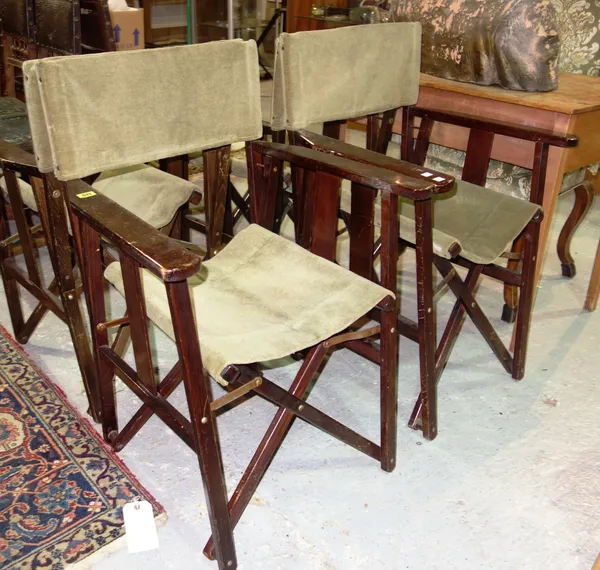 A set of four 20th century stained beech and upholstered green velvet folding directors chairs. 1   D4