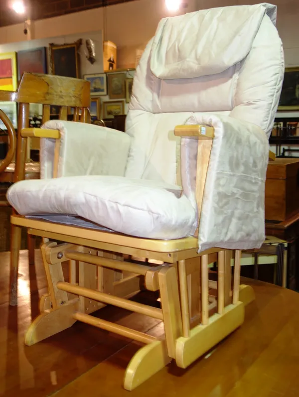 A 'Hauck' 20th century rocking chair.  I7