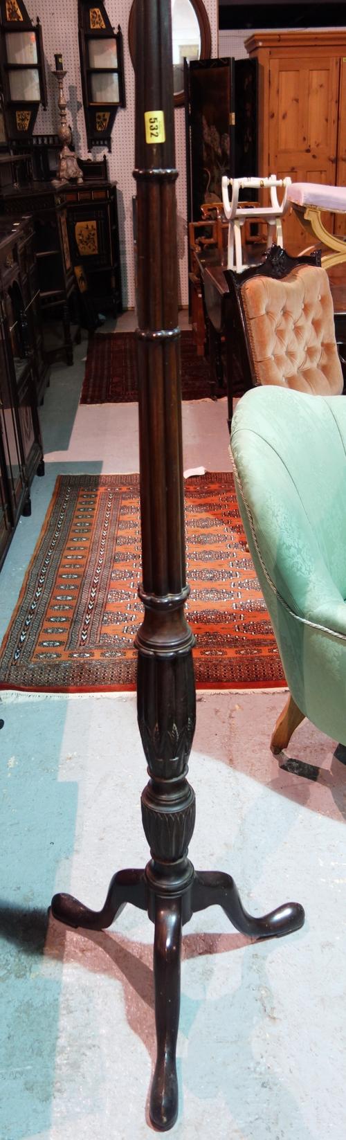 A mahogany cluster column standard lamp, on tripod base.   G10