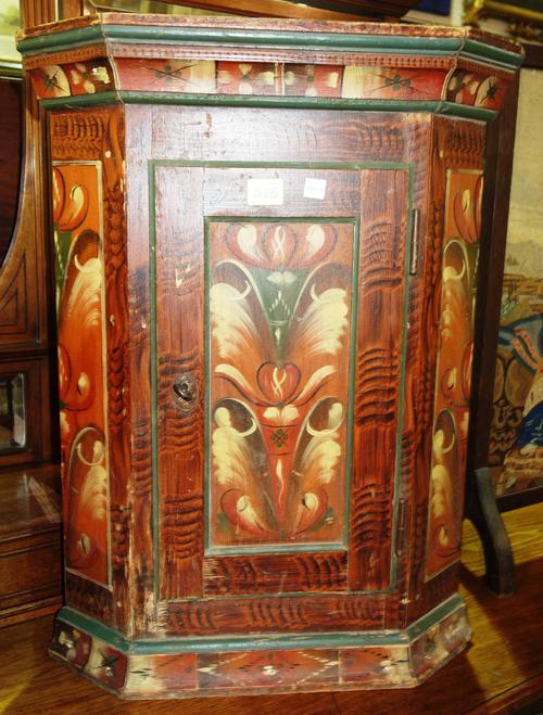 A Tyrolean painted pine small corner cupboard, a basket top occasional table and two faux bamboo occasional tables, (4).   F10