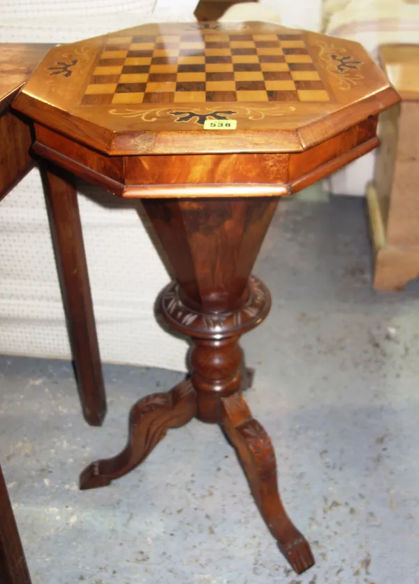 A Victorian walnut games table, with chequer top and octagonal support.   F8