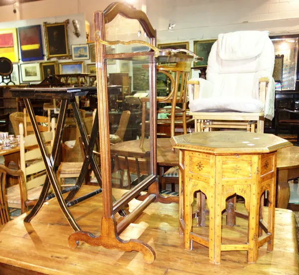An Edwardian satinwood two tier occasional table, an ebonised folding table, a brass inlaid octagonal folding table and a glass fire screen.  (4).   I