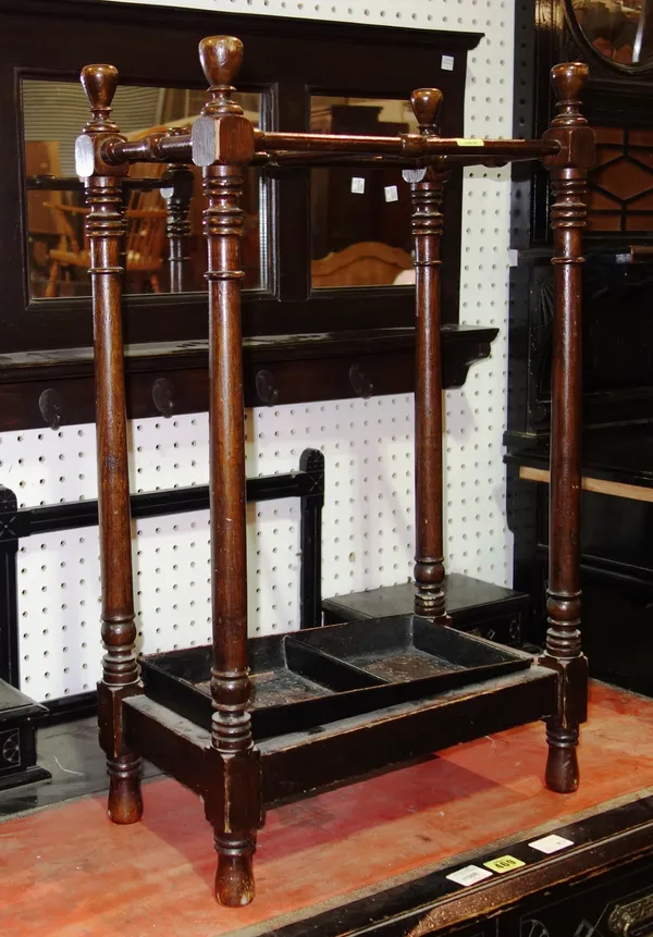 A 19th century oak twin division stick stand with turned decoration and a three panel wall mirror with shelf, (2).  I11