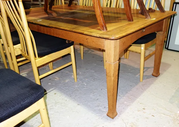 A 20th century oak extending dining table with two extra leaves, 142cm long x 73cm high, 176cm long fully extended.  H1