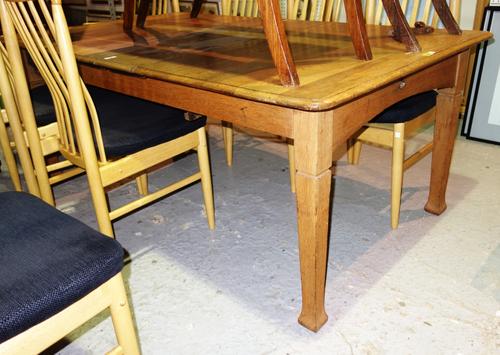 A 20th century oak extending dining table with two extra leaves, 142cm long x 73cm high, 176cm long fully extended.  H1