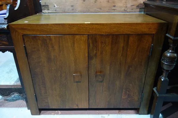 A 20th century hardwood two door cupboard, 95cm wide x 76cm high.  G9