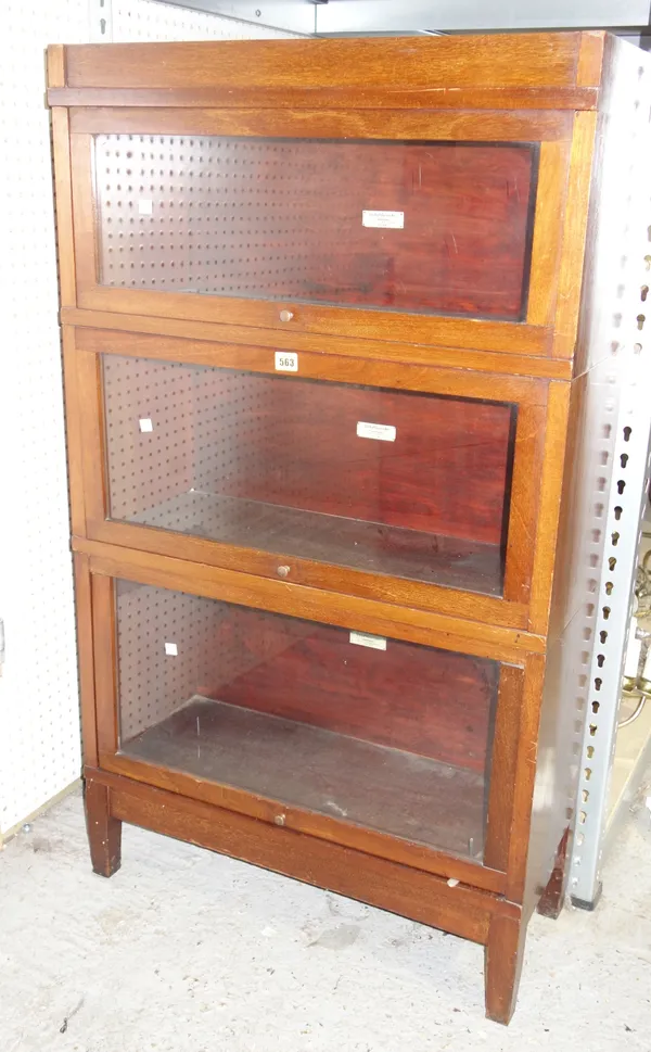 A Globe Wernicke style mahogany three sectioned music display cabinet, 71cm wide x 136cm high.         M4