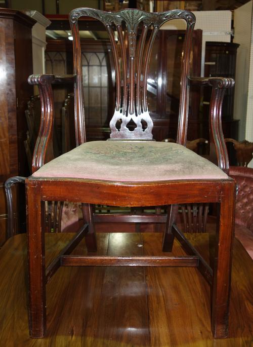 A set of four George III style mahogany dining chairs, together with a George III mahogany ladder back dining chair, (5).    J6