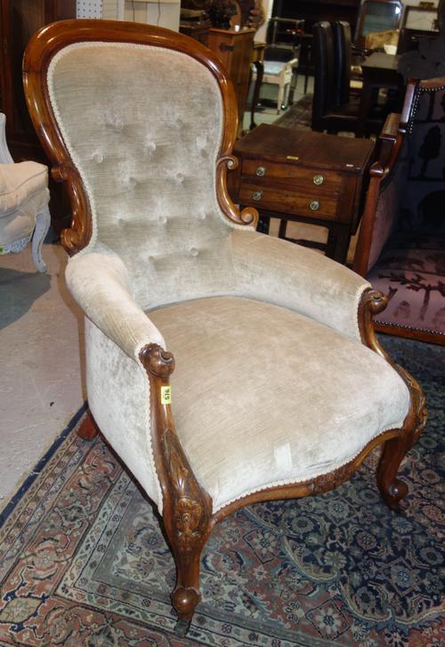 A 19th century mahogany framed spoon back nursing chair.  F5