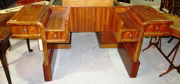 A walnut Art Deco dressing table, of unusual form, 180cm wide.  I8