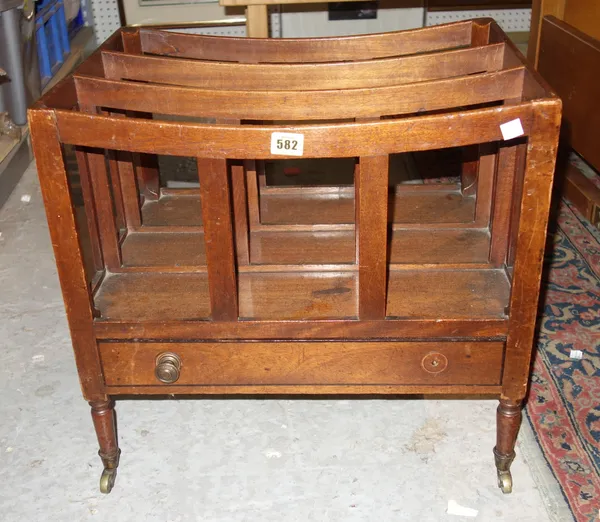 A early 20th century mahogany concave four division Canterbury, 47cm wide.   K2