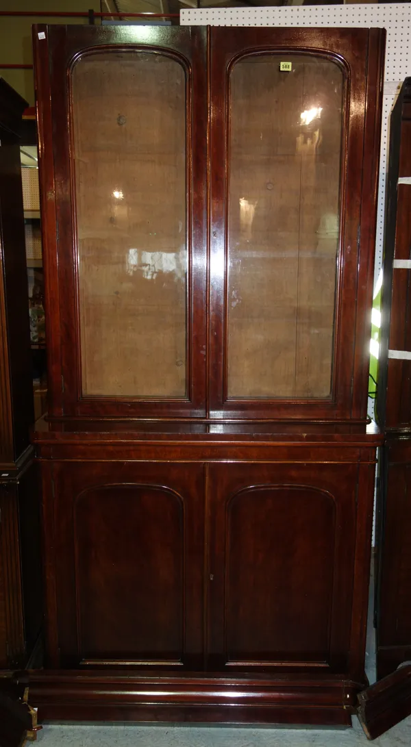 A Victorian mahogany glazed bookcase cabinet, with a pair of glazed doors over a pair of panel doors, 108cm wide.  M7