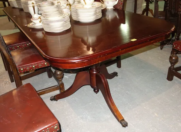A 20th century mahogany twin pedestal 'D' end dining table with one extra leaf, 166cm wide x 77cm high, 210cm wide fully extended.  F6