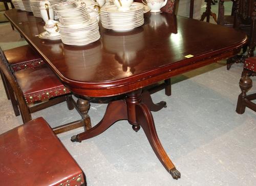 A 20th century mahogany twin pedestal 'D' end dining table with one extra leaf, 166cm wide x 77cm high, 210cm wide fully extended.  F6