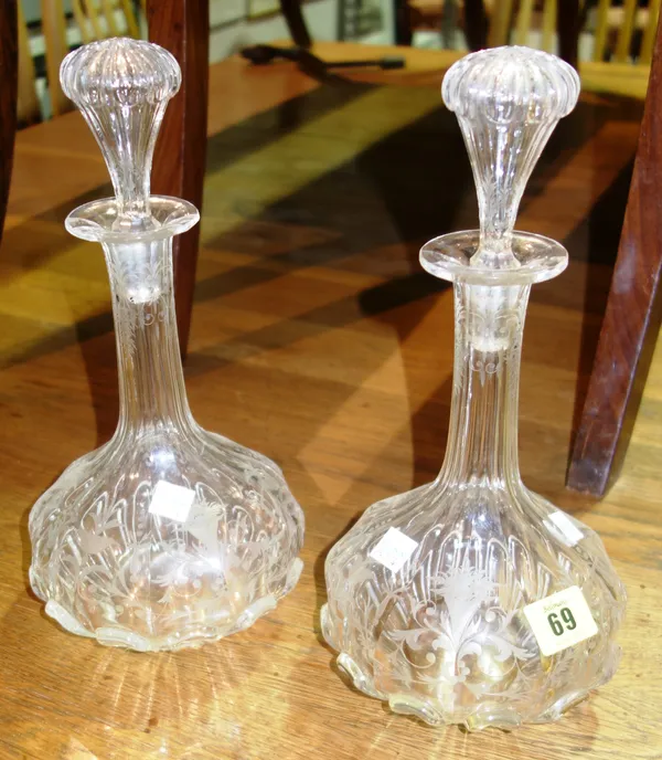 A pair of 19th century cut and etched glass decanters, (2).   S3T