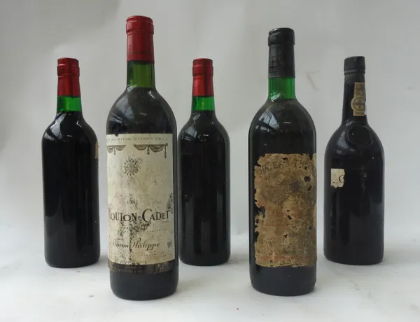 One bottle of Grahams 1975 port and seven bottles of claret, comprising; two bottles of 1978 Chateau Trapaud, 1982 Chateau Greysac, a 1976 Chateau Dau