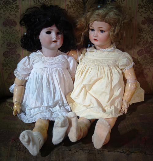 Two similar early 20th century toy dolls, both with moveable joints, with celluloid bodies, (2).  S2B