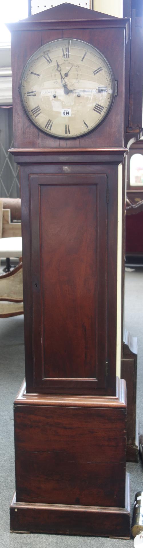 An early Victorian mahogany longcase clock by Barwise, London, the case with an arched pediment above the trunk with inset door on plinth base; the 12