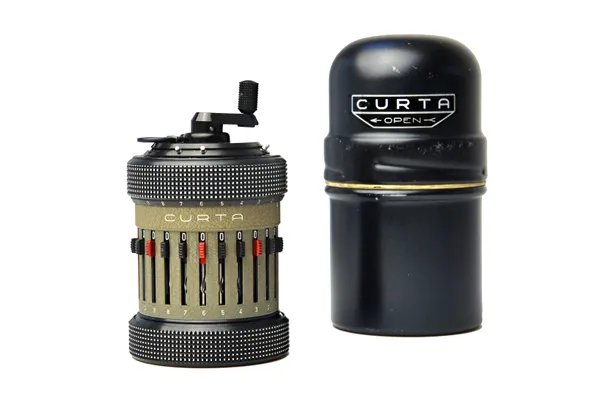 A Curta type II calculator, serial number 522532, made in Liechtenstein, in a cylindrical metal fitted case, 11cm.  Illustrated