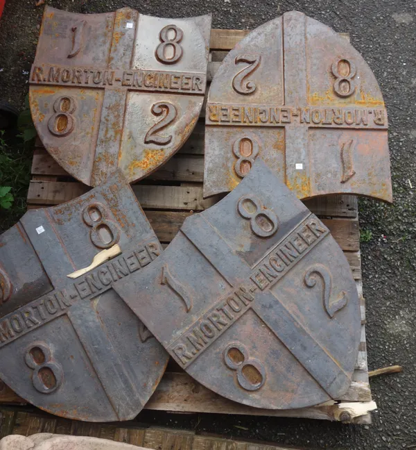 Four cast iron shields, possibly drain covers or wall bosses, each cast in relief 'R. Morton Engineer 1882', 60cm high, (4).