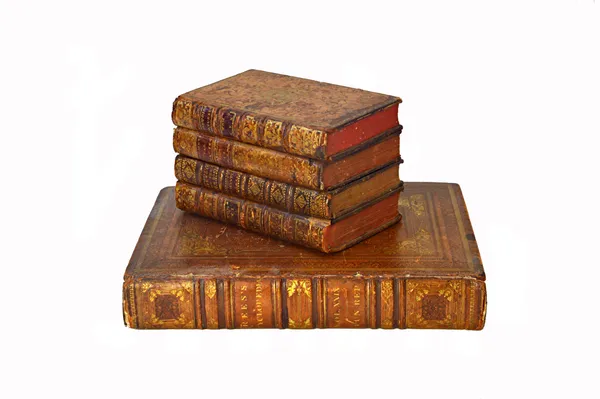 A novelty decanter case formed as a stack of four leather bound Victorian books (lacking contents), 17cm wide, and one further Victorian leather bound