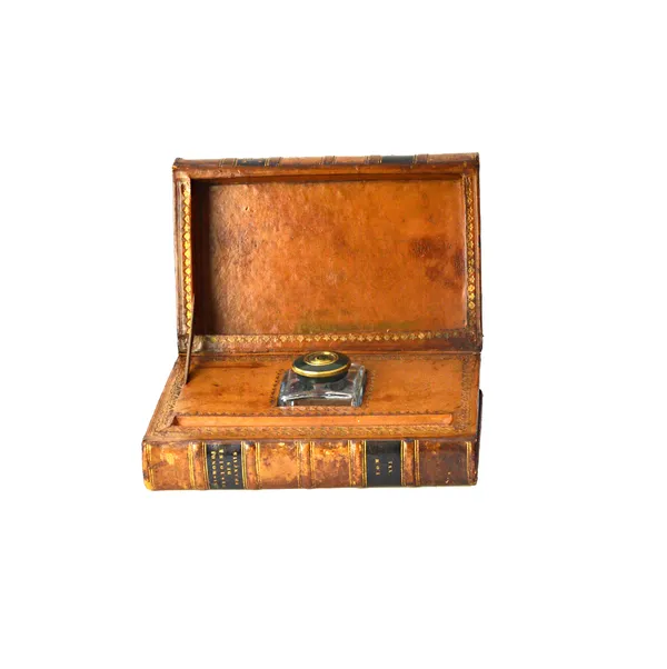 A novelty inkwell, formed as two leather bound Victorian books 'Sismondi Histoire des Francais', opening to reveal a square glass ink bottle and pen r