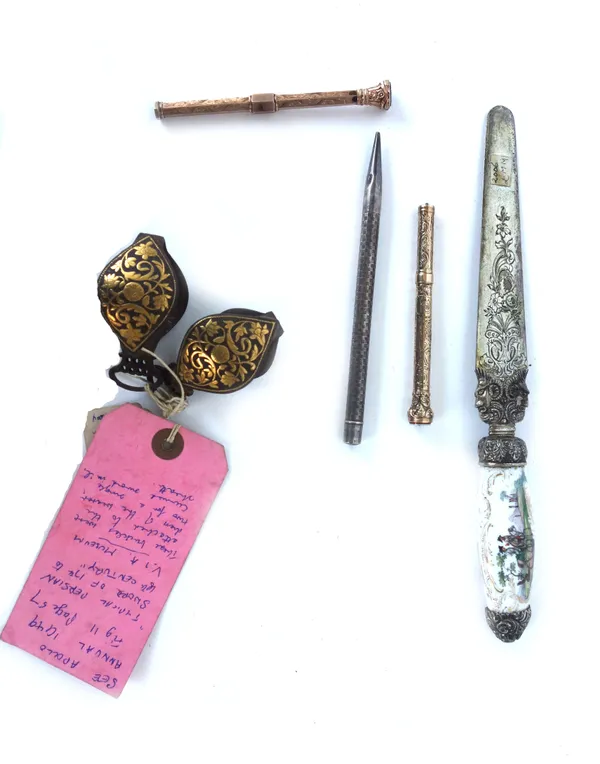 A silver plated letter opener with a Meissen style porcelain handle, 24cm long, two Persian steel and brass inlaid sword mounts, possibly 18th century