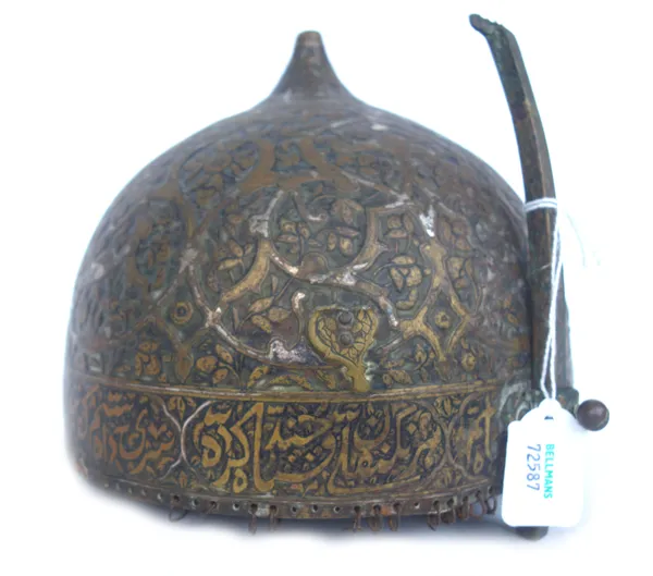 A Safavid 'Kula Khud' steel helmet, 18th century, foliate decorated, with adjustable noseguard (a.f), 16cm high.