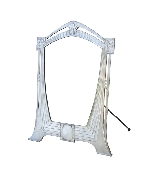 A W.M.F style 'secessionist' silvered metal table mirror, circa 1910, model no.120, with bevelled shaped plate and openwork frame, 53cm high.  Illustr