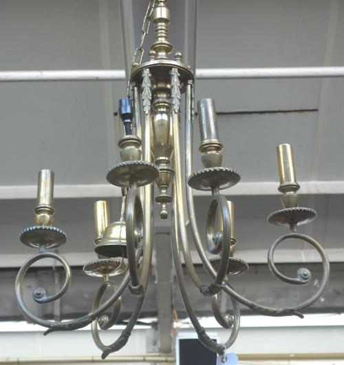 A gilt brass six branch chandelier, late 19th/early 20th century, the baluster stem issuing six reeded scroll arms supporting sconces (a.f), 73cm high