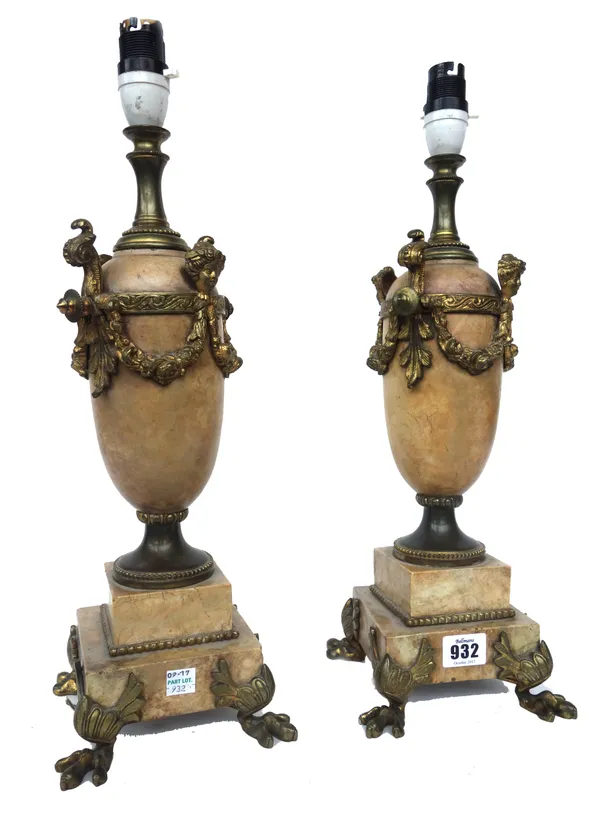 A pair of Italian marble and gilt bronze mounted table lamps (converted), 19th century, each of urn form, cast with floral swags and masks, on a squar