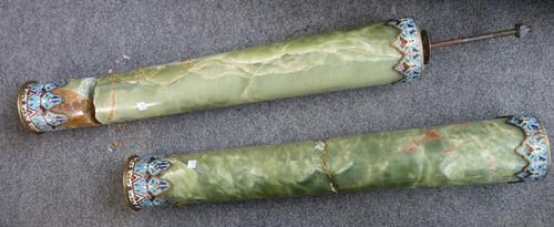 A pair of onyx, ormolu and champleve columns, 19th century, each with square top and base united by a cylindrical tapering column (a.f), (2).