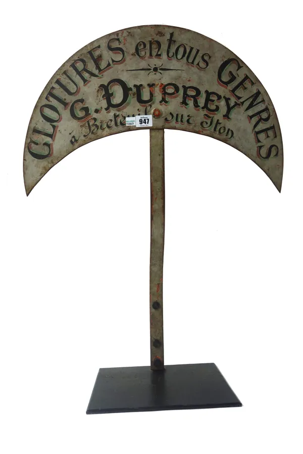 A French polychrome painted tin shop sign 'Clotures en tous Genres, G. Duprey', on a later metal stand, 68cm high, together with a copper bucket with
