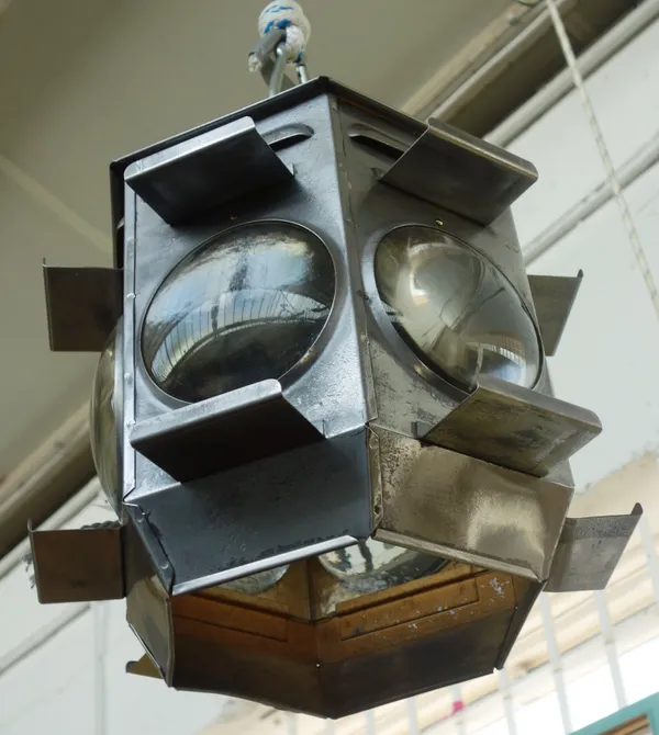An industrial sheet steel and glass lantern, late 20th century, of hexagonal form, with inset convex glass panels, 29cm high.