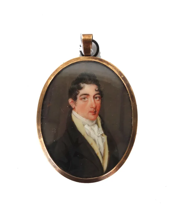 An early 19th century English School portrait miniature on ivory of a gentleman in a black coat with pale yellow inner coat, the glazed reverse with p